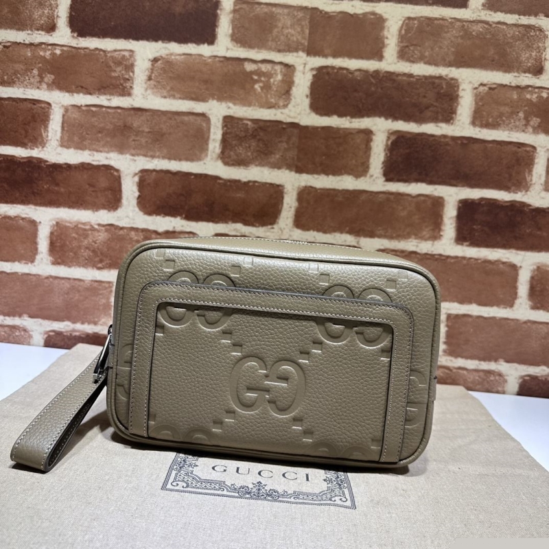 G*u*i clutch bags